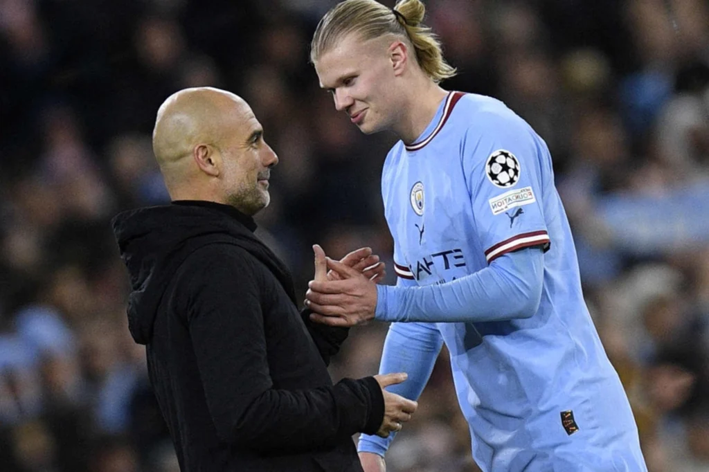 Guardiola sai em defesa de Haaland após nova enxurrada de críticas Guardiola voltou a defender Haaland das críticas que vem sofrendo pelo seu desempenho (Foto: OLI SCARFF / AFP)