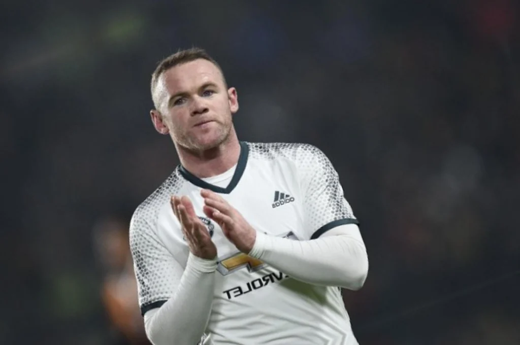 Mourinho confirma permanência de Rooney no Manchester United Oli SCARFF / AFP